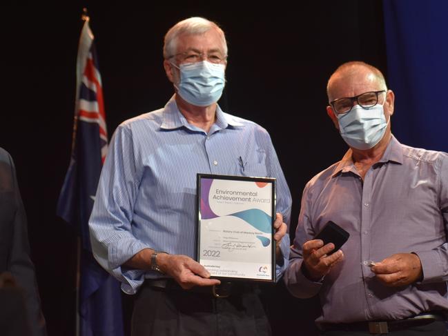 Larry Slattery and Dan Davis accepting the Environmental Achievement Award on behalf of the Rotary Club of Mackay North at the Mackay Australia Day awards at the MECC on January 25, 2022. Picture: Lillian Watkins