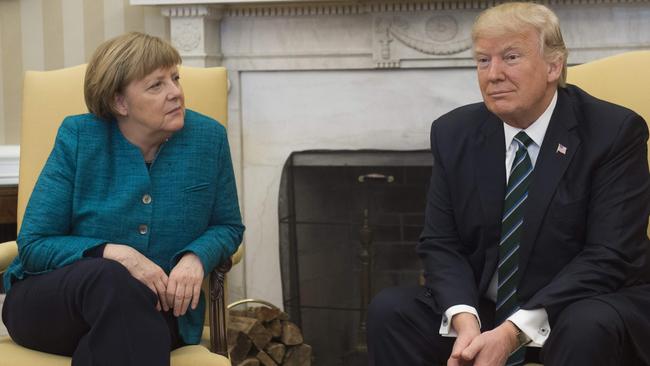 US President Donald Trump and German Chancellor Angela Merkel meet in the Oval Office of the White House. Saul Loab/AFP Photo