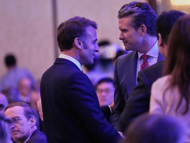 French President Emmanuel Macron and US Defense Secretary Pete Hegseth talk during the 22nd Shangri-La Dialogue summit in Singapore. Picture: AP Photo
