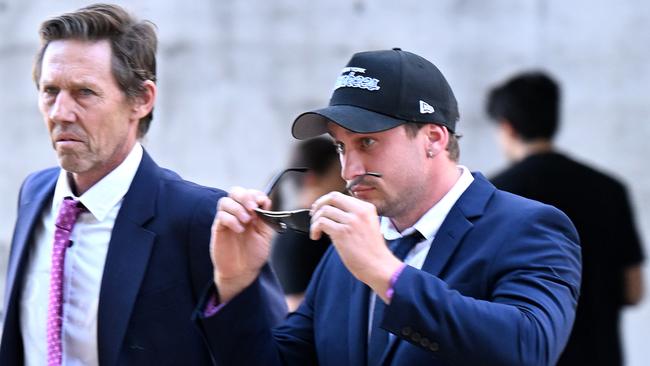 Will Warren (centre) was joined by supporters as he arrived at Brisbane Supreme Court on Thursday to be formally sentenced. Picture: Dan Peled / NCA NewsWire