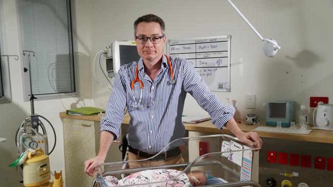 CHHHS clinical director of paediatrics Dr Neil Archer is backing calls for a Cairns University Hospital to greatly improve treatment for babies in remote areas of Far North Queensland and the Torres Strait. Dr Neil Archer with 35-week-old Akiera Hawes from Innisfail in the Cairns Hospital paediatrics ward. PICTURE: STEWART McLEAN