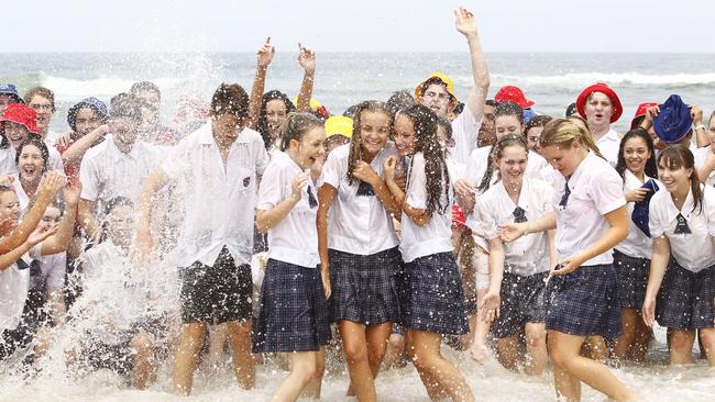 Aquinas Year 12s Celebrate End Of High School With Traditional Gold Coast Run Into The Surf At 