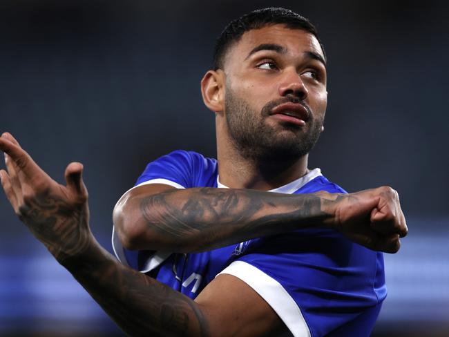 MELBOURNE, AUSTRALIA - AUGUST 12: Tarryn Thomas of the Kangaroos warms up before the round 22 AFL match between North Melbourne Kangaroos and Essendon Bombers at Marvel Stadium, on August 12, 2023, in Melbourne, Australia. (Photo by Darrian Traynor/Getty Images)