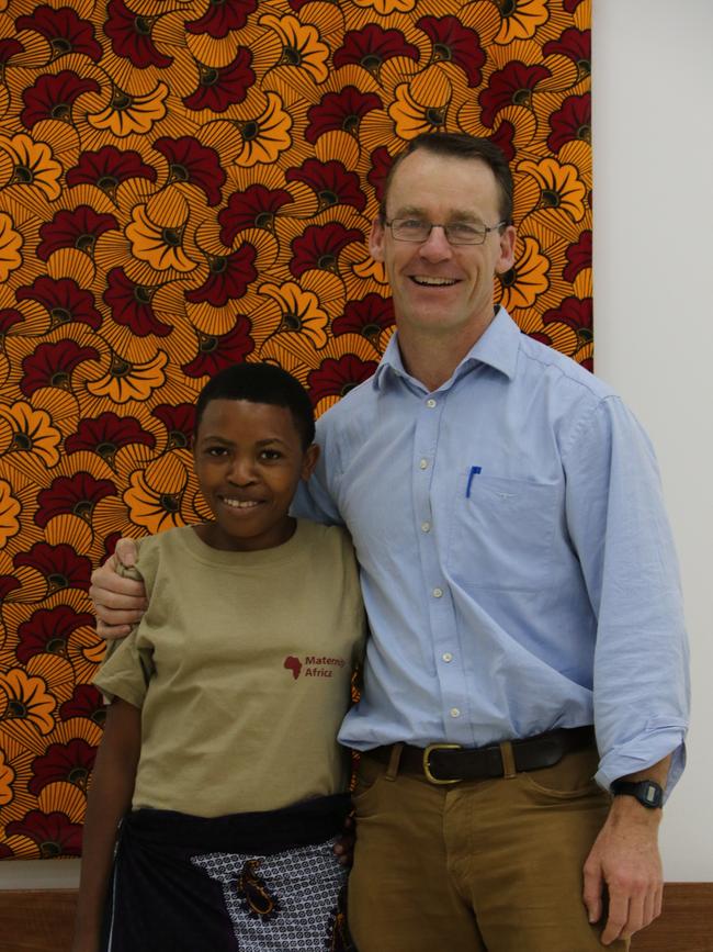 Dr Andrew Browning with one of his patients in Tanzania.