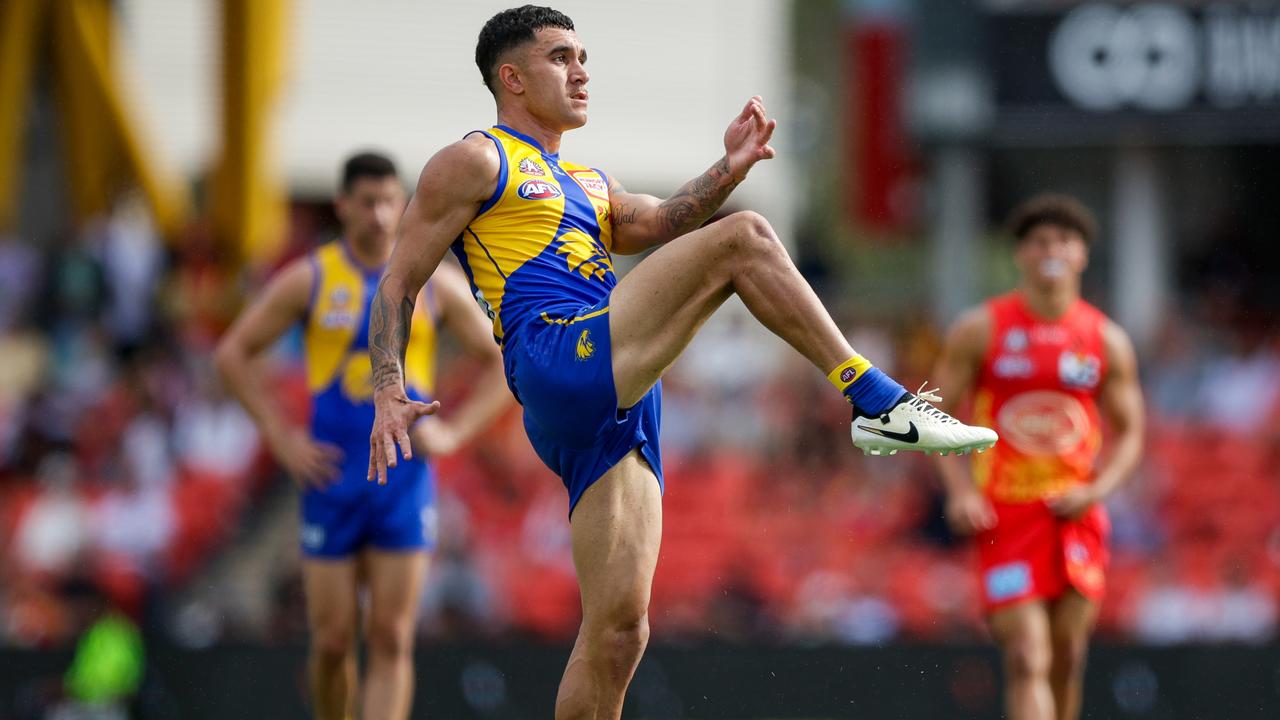 GOLD COAST, AUSTRALIA - APRIL 28: Tyler Brockman of the Eagles kicks the ball during the 2024 AFL Round 07 match between the Gold Coast SUNS and the West Coast Eagles at People First Stadium on April 28, 2024 in Gold Coast, Australia. (Photo by Russell Freeman/AFL Photos via Getty Images)