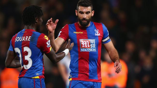 LONDON, ENGLAND - NOVEMBER 28: (L to R) Pape N'Diaye Souare, Mile Jedinak and Damien Delaney of Crystal Palace celebrate their win in the Barclays Premier League match between Crystal Palace and Newcastle United at Selhurst Park on November 28, 2015 in London, England. (Photo by Ian Walton/Getty Images)