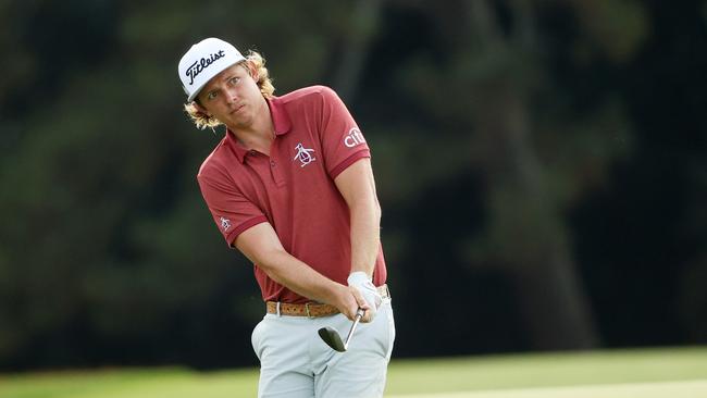 Wearing his maroon shirt in the final round at Augusta, Cameron Smith almost chipped in for birdie on the final hole on Monday morning. Pic: Patrick Smith/Getty Images/AFP