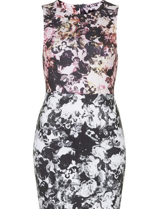 We love this bright and colourful print. TOPSHOP floral photo print dress $80. Ph: 8844 0900.