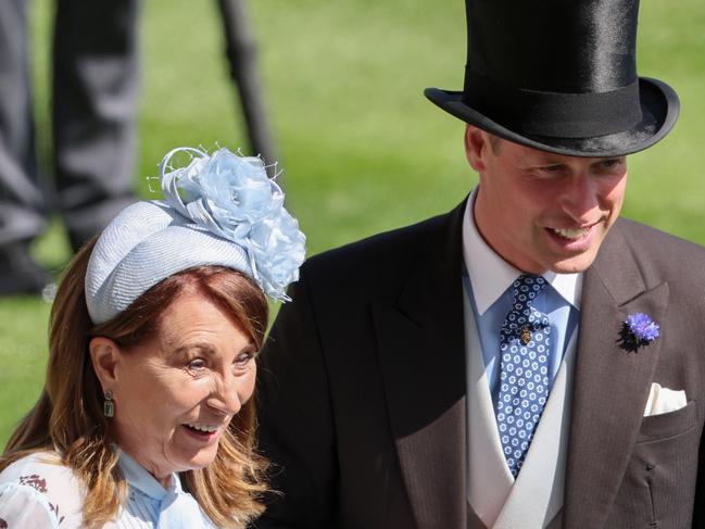 ASCOT, ENGLAND - JUNE 19: Carole Middleton holds hands with Prince William, Prince of Wales as they attend day two of Royal Ascot 2024 at Ascot Racecourse on June 19, 2024 in Ascot, England. (Photo by Chris Jackson/Getty Images)