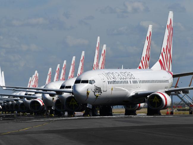 Grounded Virgin Australia aircraft at Brisbane Airport. Picture: AAP