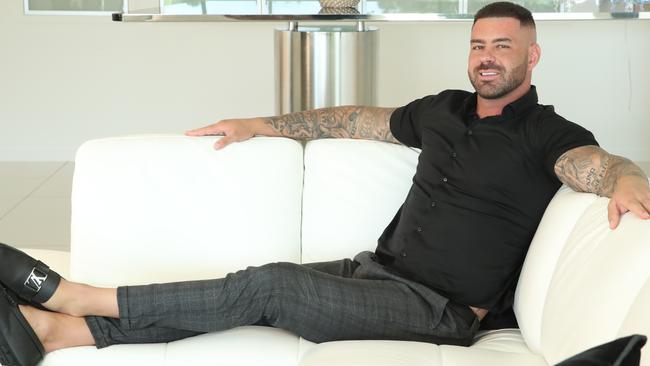 OnlyFans star Dale Egan relaxing at his luxury Benowa home. Egan went from violent convict to male adult performer, earning almost $1m per year. Picture: Glenn Hampson