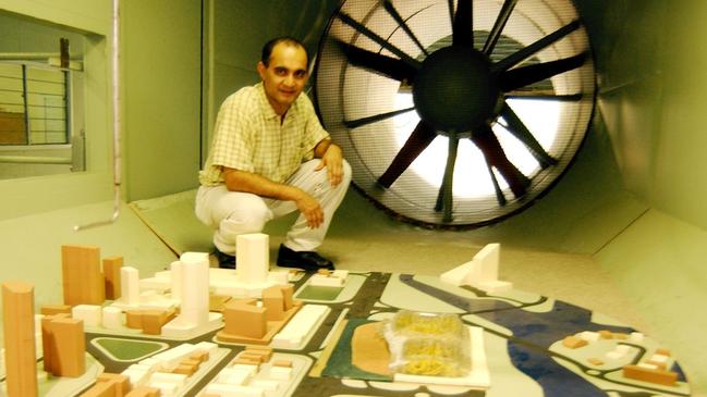 Dr John Ginger with a model of the Gold Coast Convention and Exhibition Centre and surrounding structures in the JCU wind tunnel.