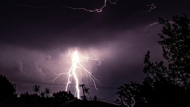 Photographer Phil Johnson captured these images of lightning over Burnside on the Sunshine Coast during the storms.