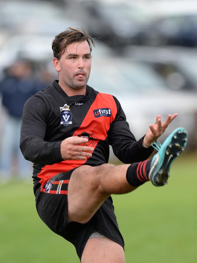 Jarryd Amalfi boots the Frankston Bombers forward.                        <a class="capi-image" capiId="a27bafd06fa28c3dfd70f491b8aeab41"></a>