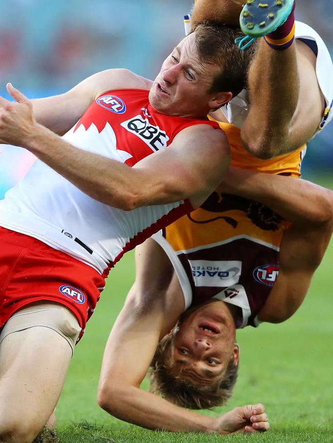 Zac Bailey (right) lays an unconventional tackle on Harry Cunningham.