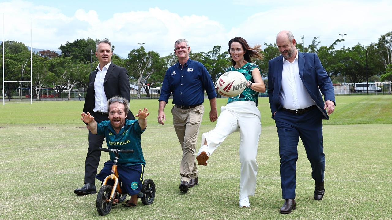 North Queensland Cowboys chairman Lewis Ramsay, paralympian Grant "Scooter" Patterson, Northern Pride chairman Terry Medhurst, Cairns Mayor Amy Eden and Cowboys chief executive Jeff Reibel walk onto the grounds at West Barlow Park in October. Picture: Brendan Radke