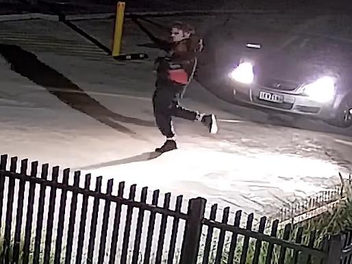 CCTV footage revealed the moment a man began spinning and cutting shapes before allegedly robbing a school. Picture: NewsWire handout