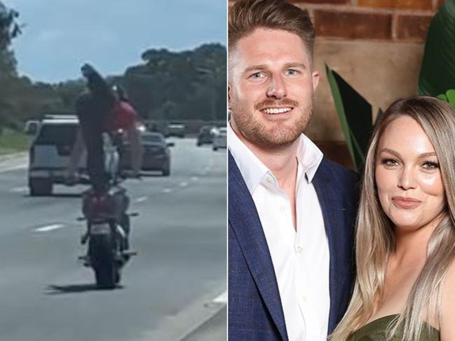 A motorbike rider pictured performing death-defying stunts while riding on the M1 in the northern Gold Coast. Picture: Melissa Rawson / Instagram.