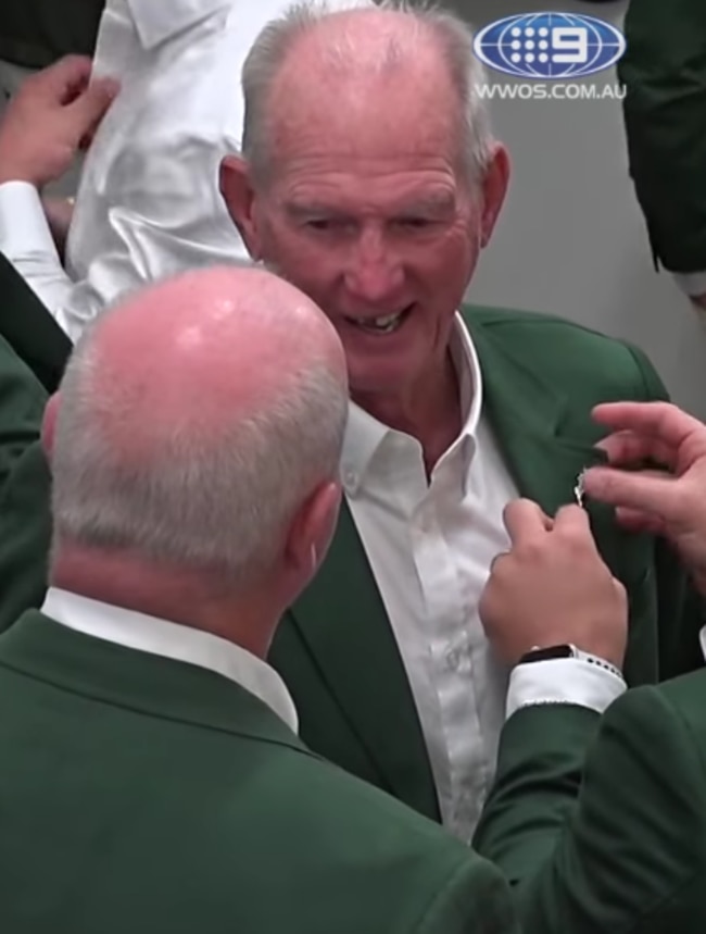 Wayne Bennett reveals his missing front tooth. Photo: Channel 9