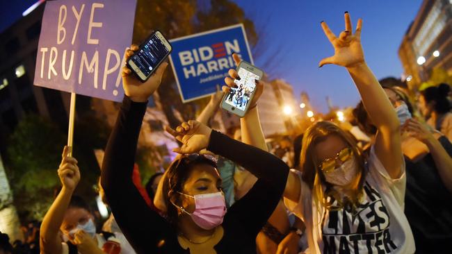 Biden supporters celebrate outside the White House in Washington. Picture: AFP