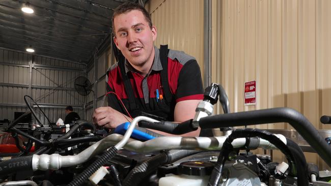 Local mechanic Alex Lees lost the use of his right arm following a near-fatal motorbike accident, now he’s up for Apprentice of the Year and Equity VET Student of the Year award for the south east region Queensland Training Awards. Picture Glenn Hampson