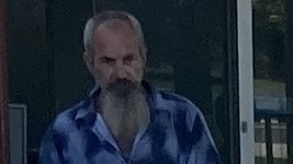 Garry Preston Branson leaves Gympie Magistrates Court after pleading guilty to more than a dozen charges, including receiving and possessing a tainted firearm after being caught with a loaded, stolen rifle in the back seat of his car.