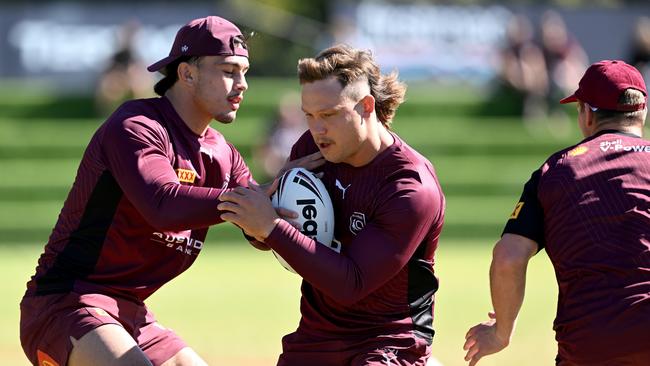Reuben Cotter and Tino Fa’asuamaleaui are late starters as the Maroons pull off some last minute changes. Picture: Getty Images.