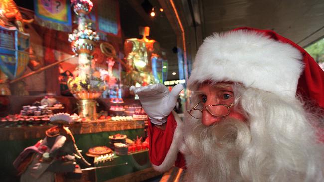 1998: Santa examines the finished product. Picture: News Limited