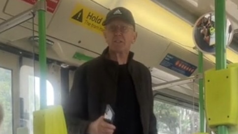 In the footage, the man is heard accosting the woman over her shirt, claiming its message about Aboriginal genocide was "offensive" to him. Picture: Supplied / TikTok