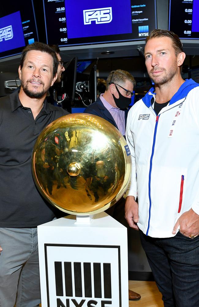 F45 co-founder and former CEO Adam Gilchrist (right, pictured with Mark Wahlberg) has disappeared. Picture: Noam Galai/Getty Images