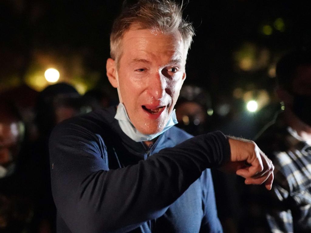 Portland Mayor Ted Wheeler reacts after being exposed to tear gas fired by federal officers while attending a protest against police brutality and racial injustice. Picture: Getty Images/AFP