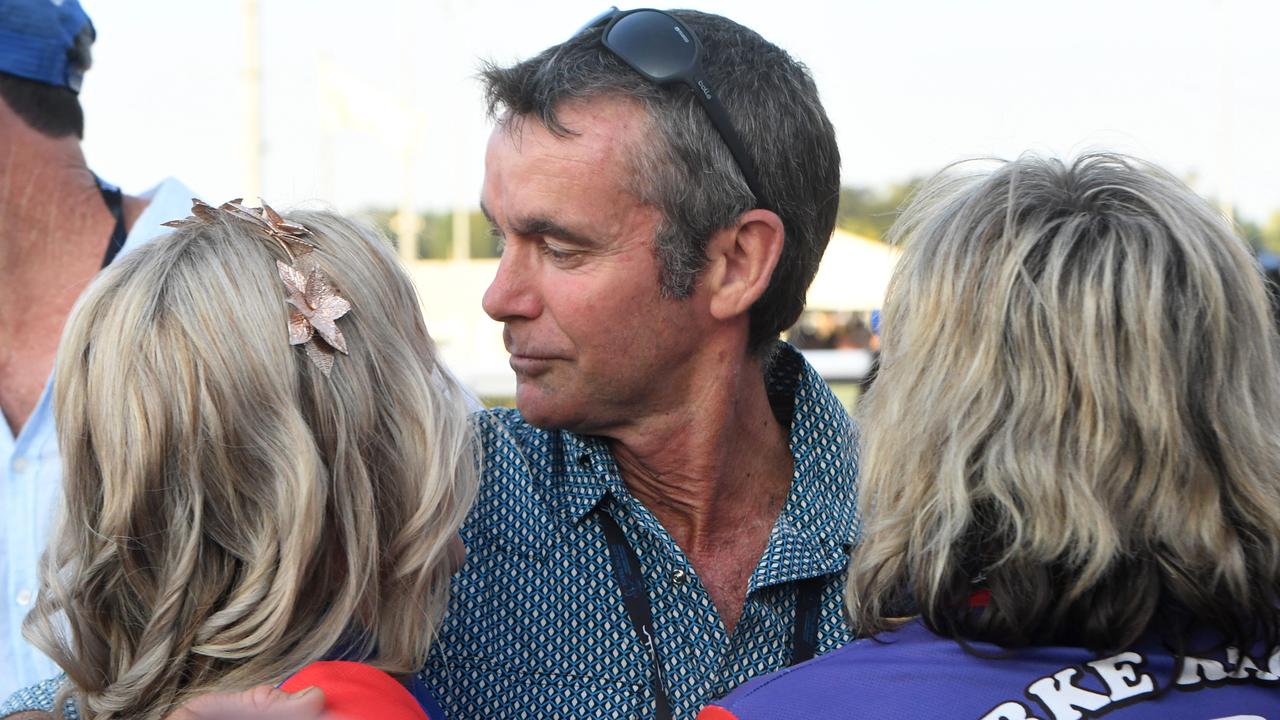 Gary Clarke hugs his wife and daughter after his horse Playoffs wins the Darwin Cup 2022. Picture: (A)manda Parkinson