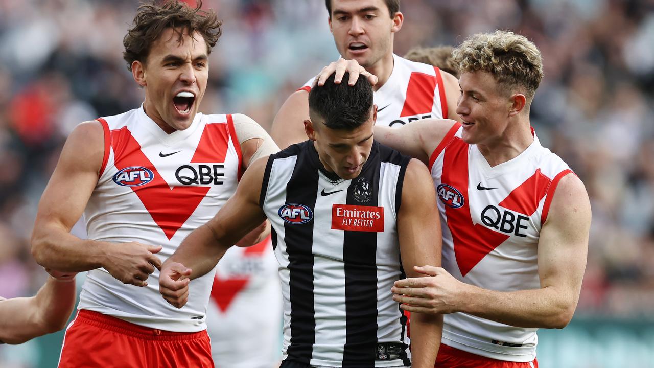 MELBOURNE. 06/05/2023. AFl. Round 8. Collingwood vs Sydney at the MCG. Swans players get stuck into Nick Daicos of the Magpies after a Ryan Clarke 1st qtr goal . Pic: Michael Klein