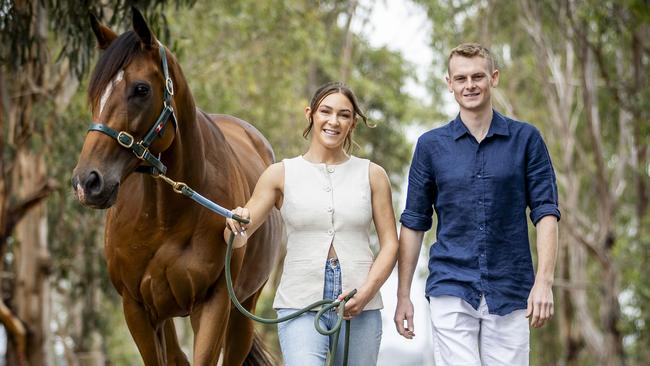 Ethan Brown with fiancee Celine Gaudray at their Skye property with Buffalo River, who ran in last year’s All-Star Mile. Picture: Jake Nowakowski