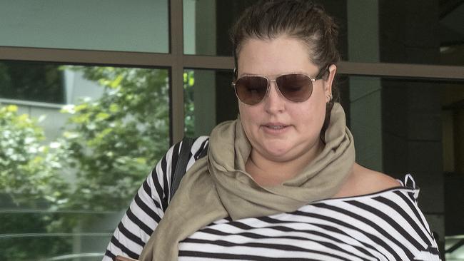 Former model and actress Kate Fischer, now legally known as Tziporah Malkah, leaves the Magistrates Court in Melbourne, Wednesday, December 6, 2107. Ms Malkah has faced court over driving matters. (AAP Image/Luis Enrique Ascui) NO ARCHIVING