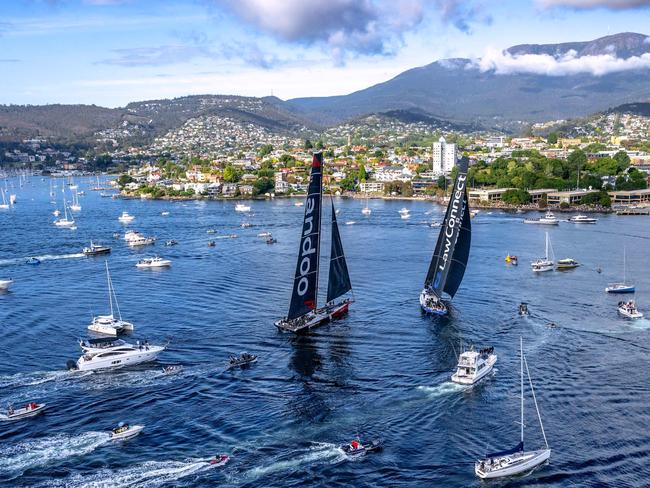 TOPSHOT - This handout image received from Rolex on December 28, 2023 shows yachts Law Connect and Andoo Comanche near the finish line of the annual Sydney to Hobart yacht race in Hobart. (Photo by Andrea Francolini / AFP) / RESTRICTED TO EDITORIAL USE - MANDATORY CREDIT 