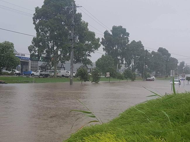 The roundabout at the corner of Beresford and Cave Hill roads near the Lilydale Industrial Estate was under water within a few minutes of the torrential rainfall.