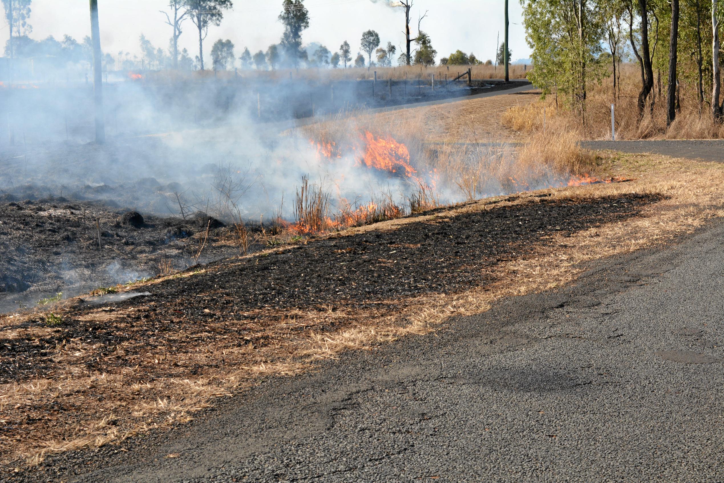 Crews are battling a grass fire which started at Philps road, Grantham. September 13, 2018. Picture: MEG BOLTON