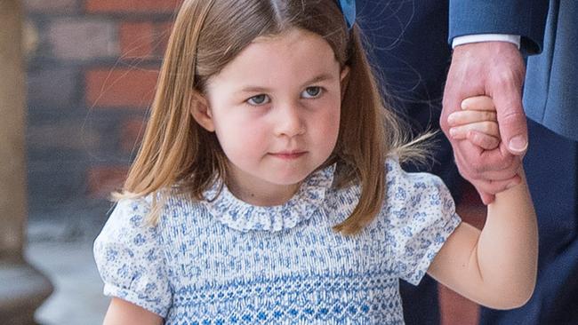 Princess Charlotte is often seen in pretty blue smocked dresses. Picture: Mega