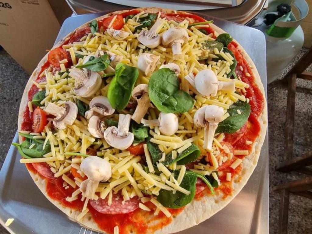 Making a pizza with more toppings. Picture: Tahnee-Jae Lopez-Vito/news.com.au.