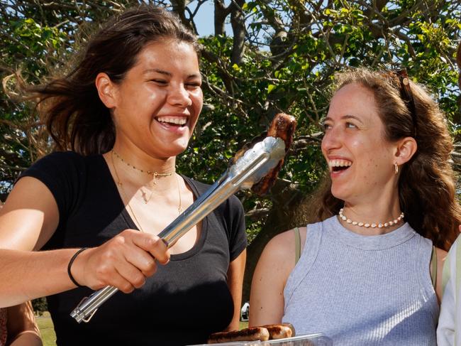 WEEKEND TELEGRAPH SEPTEMBER 30, 2023. The price of meat may be coming down as farmers reduce their stock of beef and lamb. Friends from France (pictured having their first BBQ ini Maroubra is (left) Marie Chamalot, Raphaelle Besnard, Hortense Favier, Come Malezieux and Nicholas Guillet.  Picture: David Swift