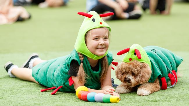 Harri, 7, and her dog, Monty, who won the “pup/owner lookalike” competition at the Neutral Bay Club’s pampered pooch parade. Picture: Max Mason-Hubers