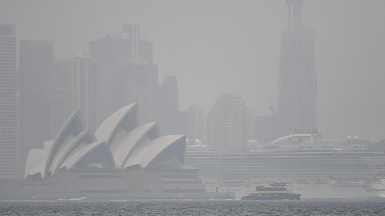 The Sydney Opera House is seen through smoke haze from bushfires in Sydney on January 8. Picture: Steven Saphore/AAP