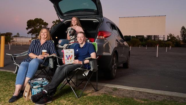 Vicki, Emily, and James Best and their dog Diesel, 7 at the Wallis Cinema Drive-in at Gepps Cross. Picture: Matt Loxton