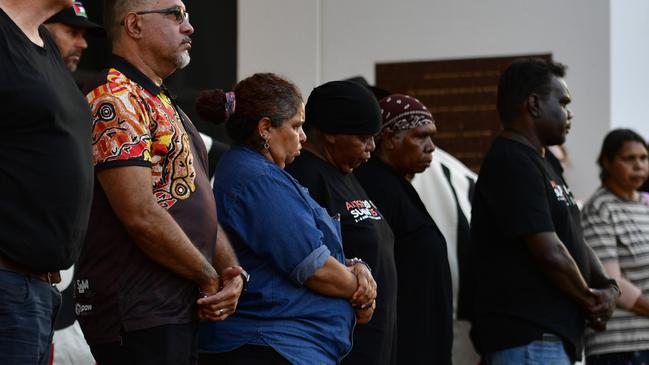 Warlpiri community leaders stood outside the NT Parliament on Wednesday during a vigil for Kumanjayi White, a 24-year-old Yuendumu man with a disability who died after being restrained by police in the Alice Springs Coles. Picture: Zizi Averill