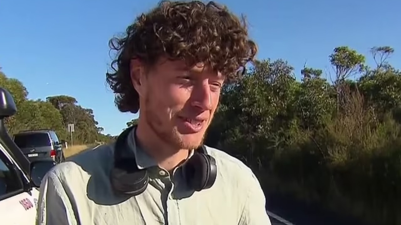 Daniel Hart, 27, spent 24 hours in freezing conditions after falling off a cliff and being forced to cling to a remote rock edge. Picture: Nine News