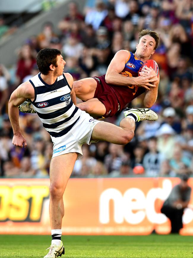 Lincoln McCarthy takes a huge grab against his former club Geelong. Picture: Bradley Kanaris/AFL Photos via Getty Images