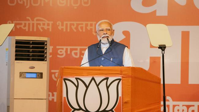 India's Prime Minister, Narendra Modi, speaks to his supporters after the election result announcement at his party's headquarters. Picture: Getty Images.