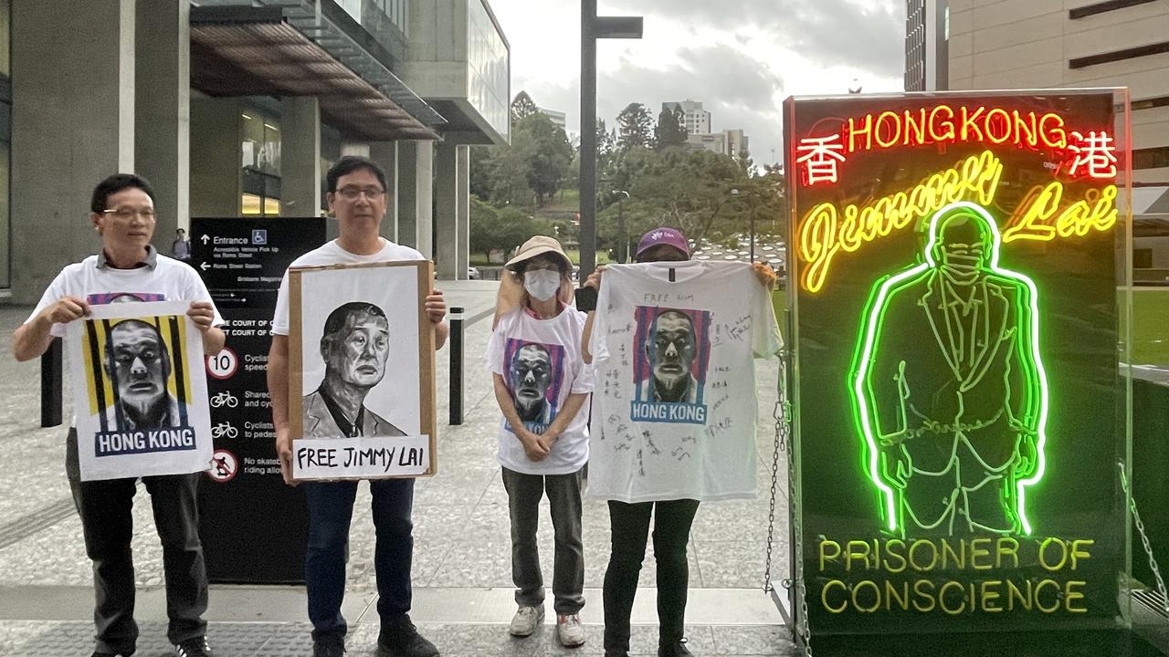 Activists outside Brisbane’s Supreme Court to protest an Australian judge’s role in Hong Kong’s Appeal Court.