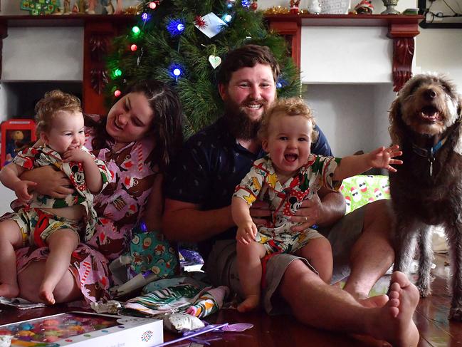 Claire Fealy sits alongside husband Will and her 20 month old twins Charlotte and Dianna at home in Belrose, New South Wales, Friday, 25 December 2020. Ms Fealy is celebrating Christmas away from her mum for the first time because she lives in the red zone on the northern beaches. Picture - Sam Mooy/The Australian Newspaper.